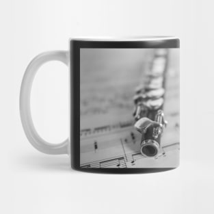 Wooden flute on sheet music Mug